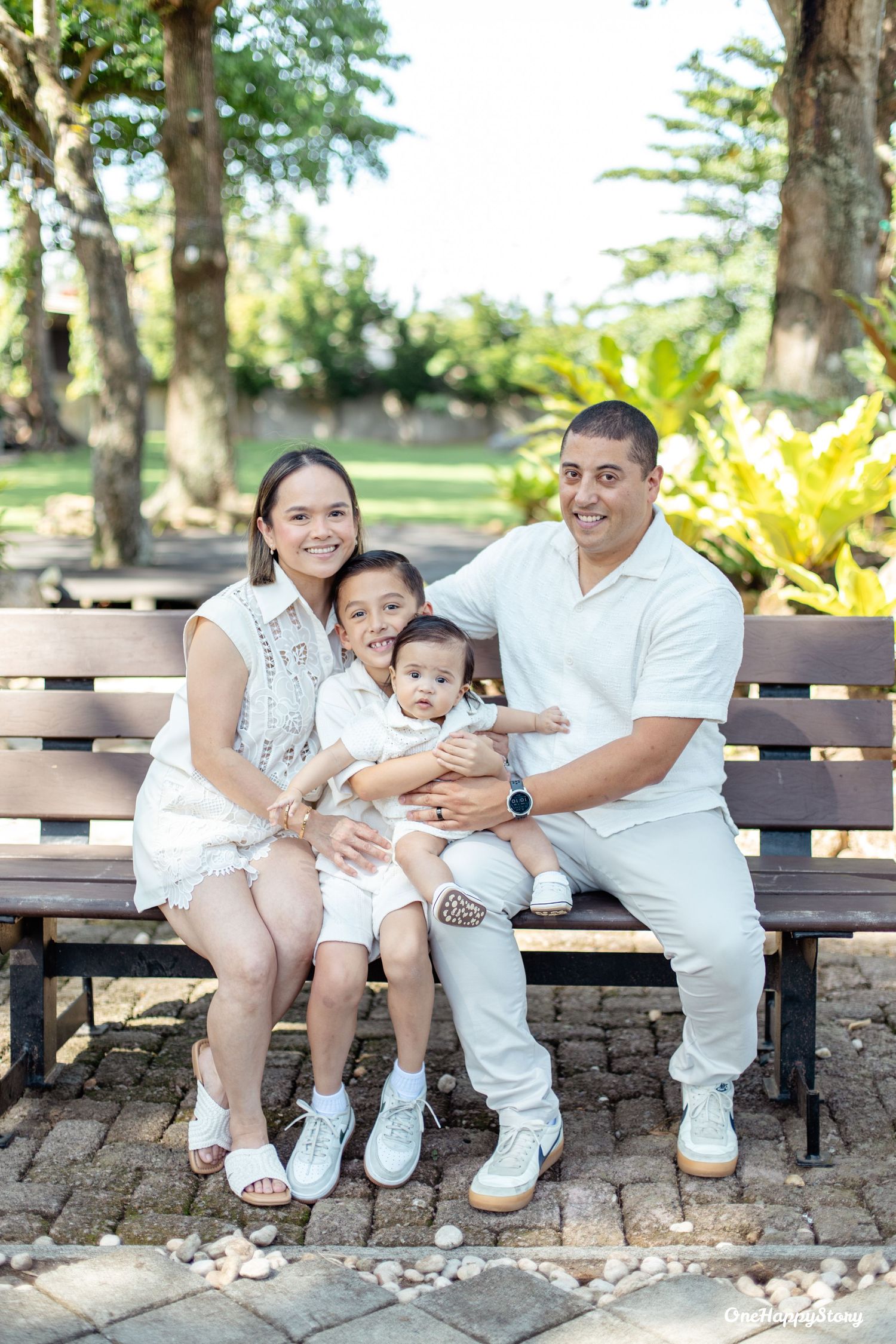 Family portrait session at Cove Gardens and Resort featuring parents and children sharing natural smiles and candid moments.