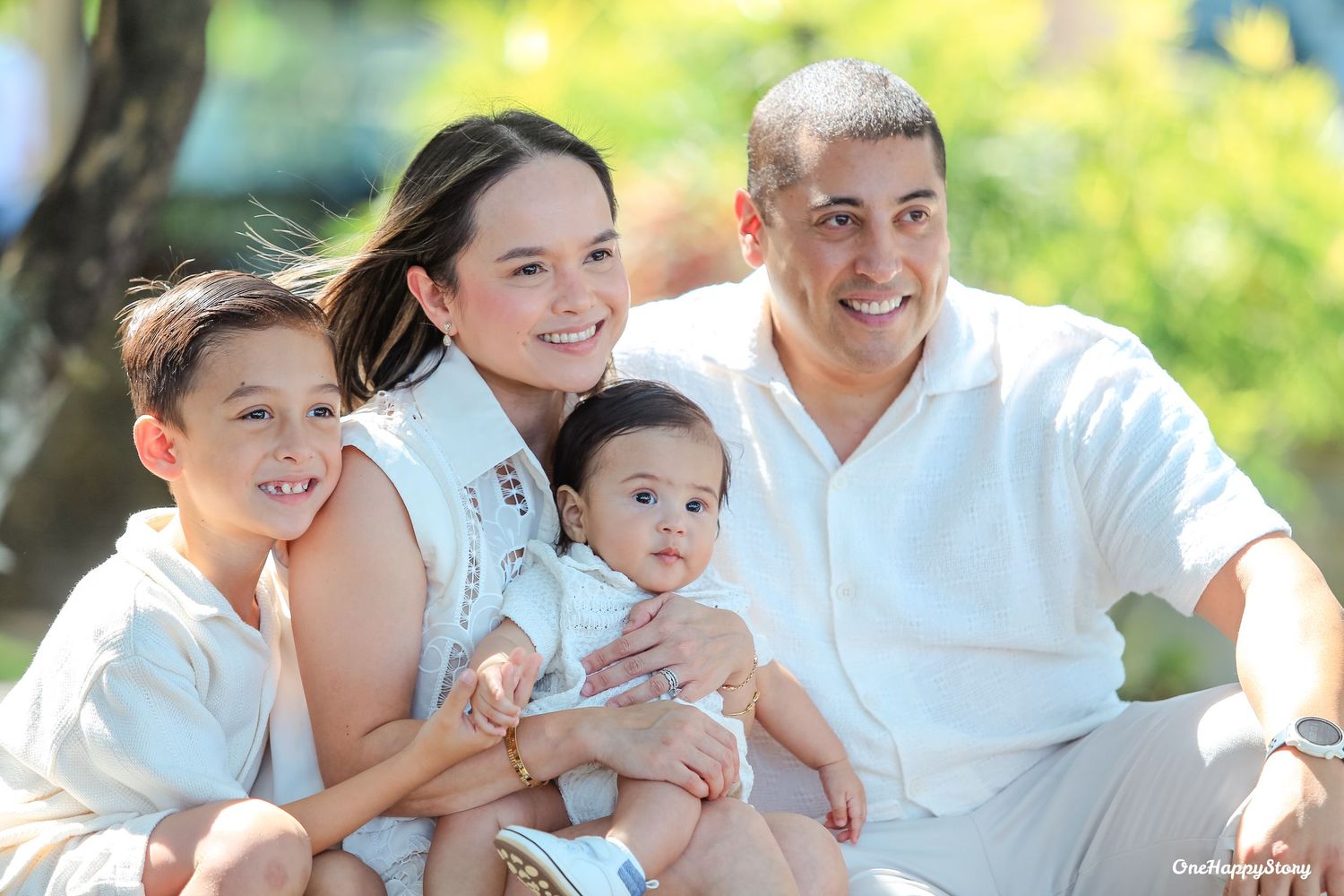 Family portrait session at Cove Gardens and Resort featuring parents and children sharing natural smiles and candid moments.