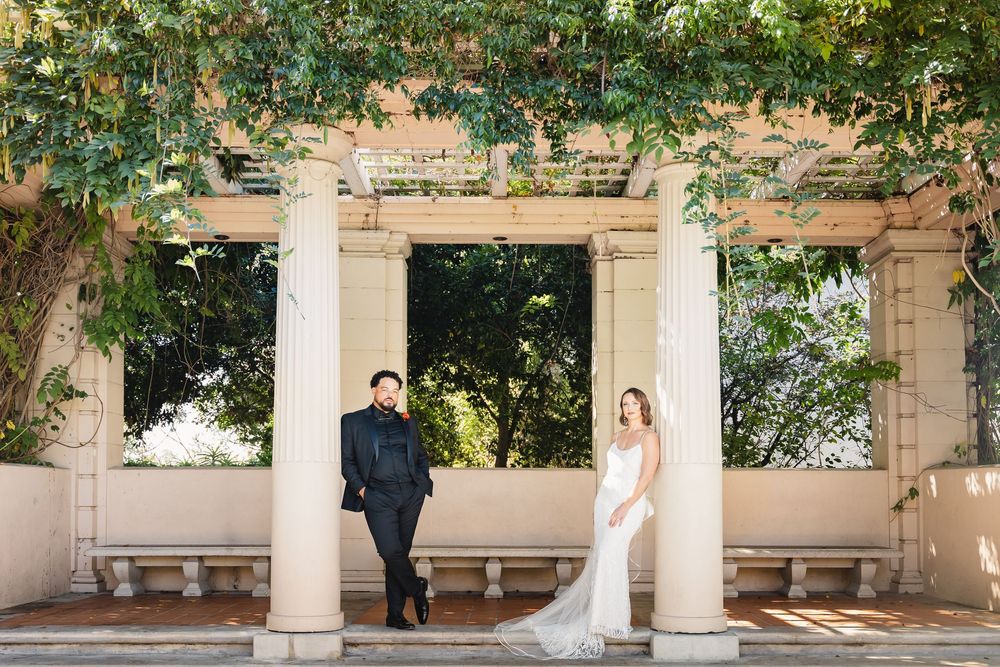 Bride and Groom wedding portraits at Alcázar Garden in Balboa Park