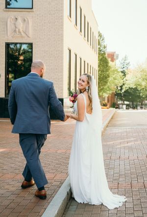 A couple in wedding attire walking away together on a brick courtyard in a sequence of photos.