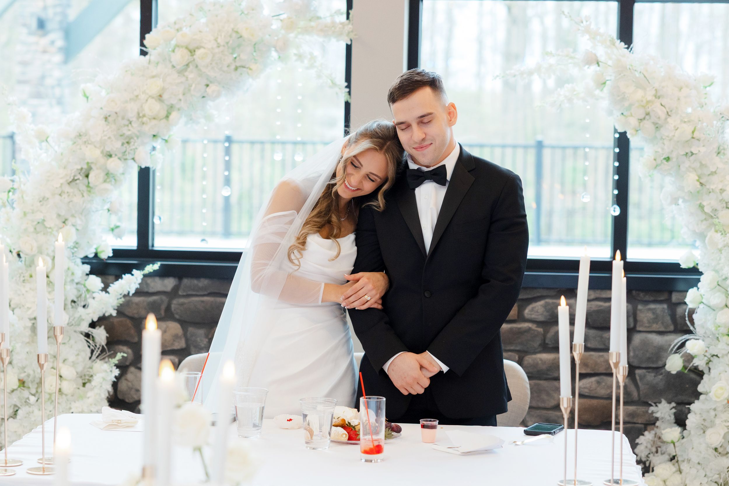 Bride and groom embrace at Reserve at Stone Creek in North Canton photographed by Tom Forrest from Hudson, Ohio.