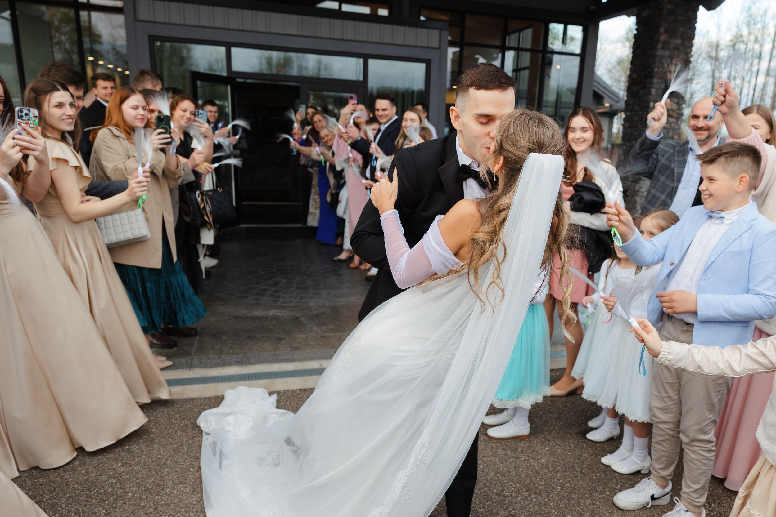Bride and groom grand exit from Reserve at Stone Creek in North Canton photographed by Tom Forrest from Hudson, Ohio.