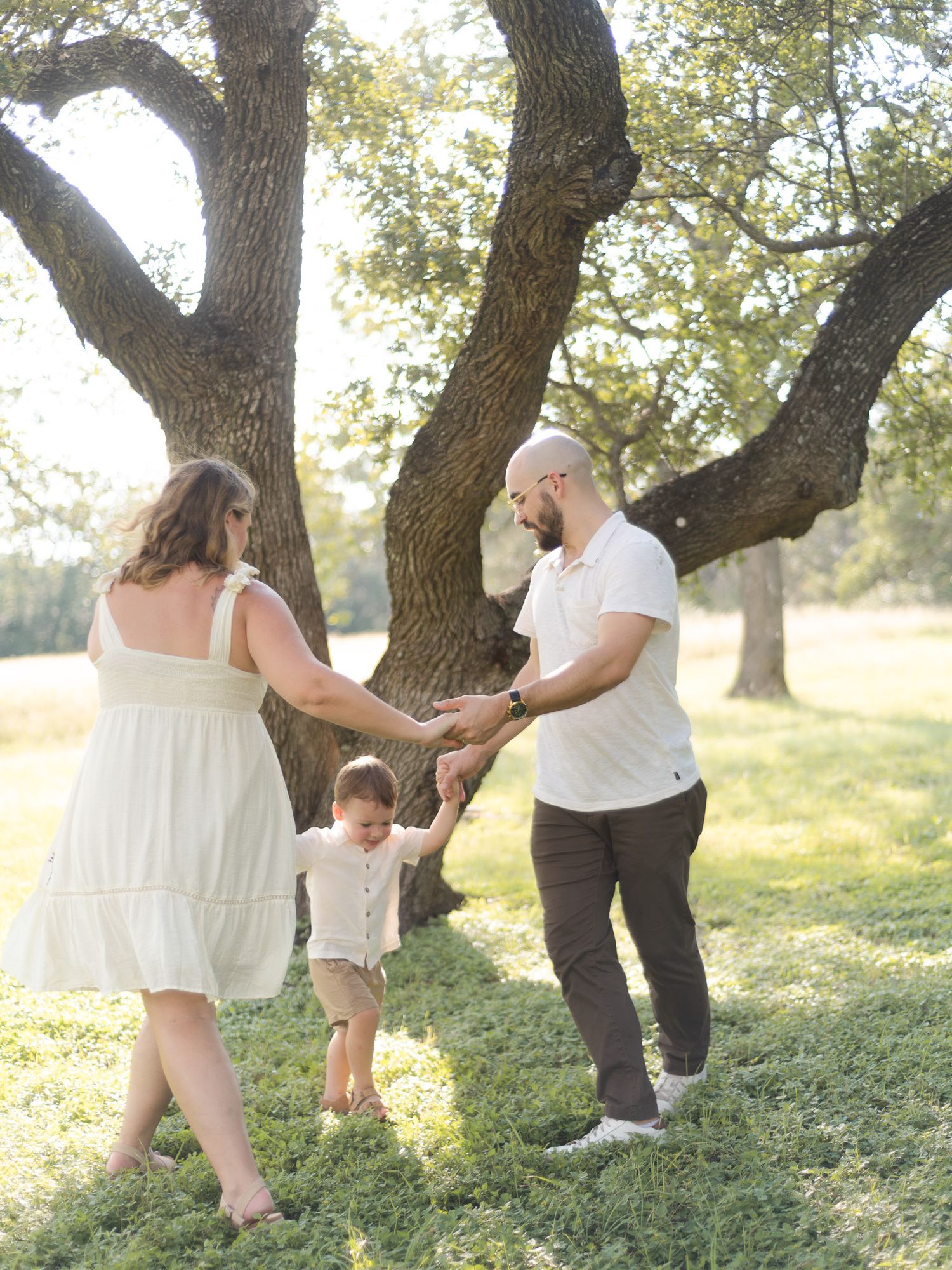 Mom holding baby during family session at Salado Creek with a Belton Texas family photographer