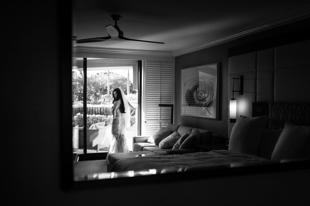 Maui wedding photographer photo against beautiful Maui beach sunset and Four Seasons Resorts by ohwowfotos.