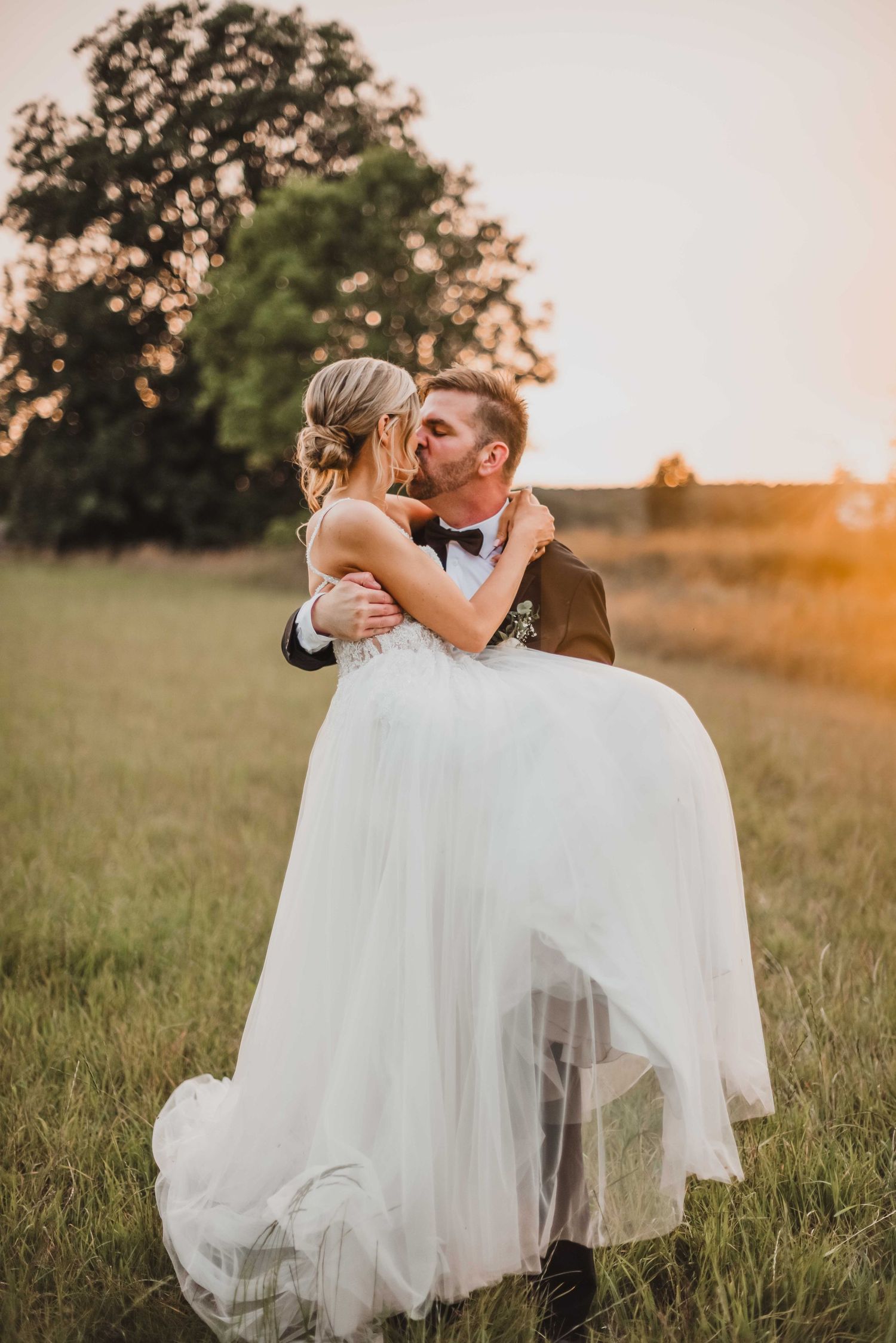 A romantic dip dance at a wedding reception with a flowing white dress displayed across multiple sequential photos.