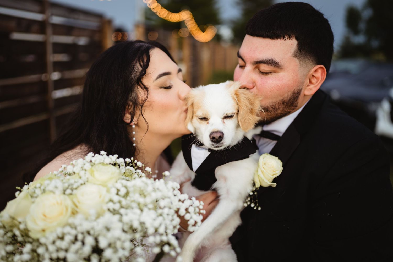 A romantic wedding photo collage featuring white baby's breath flowers and tender moments between the newlyweds.