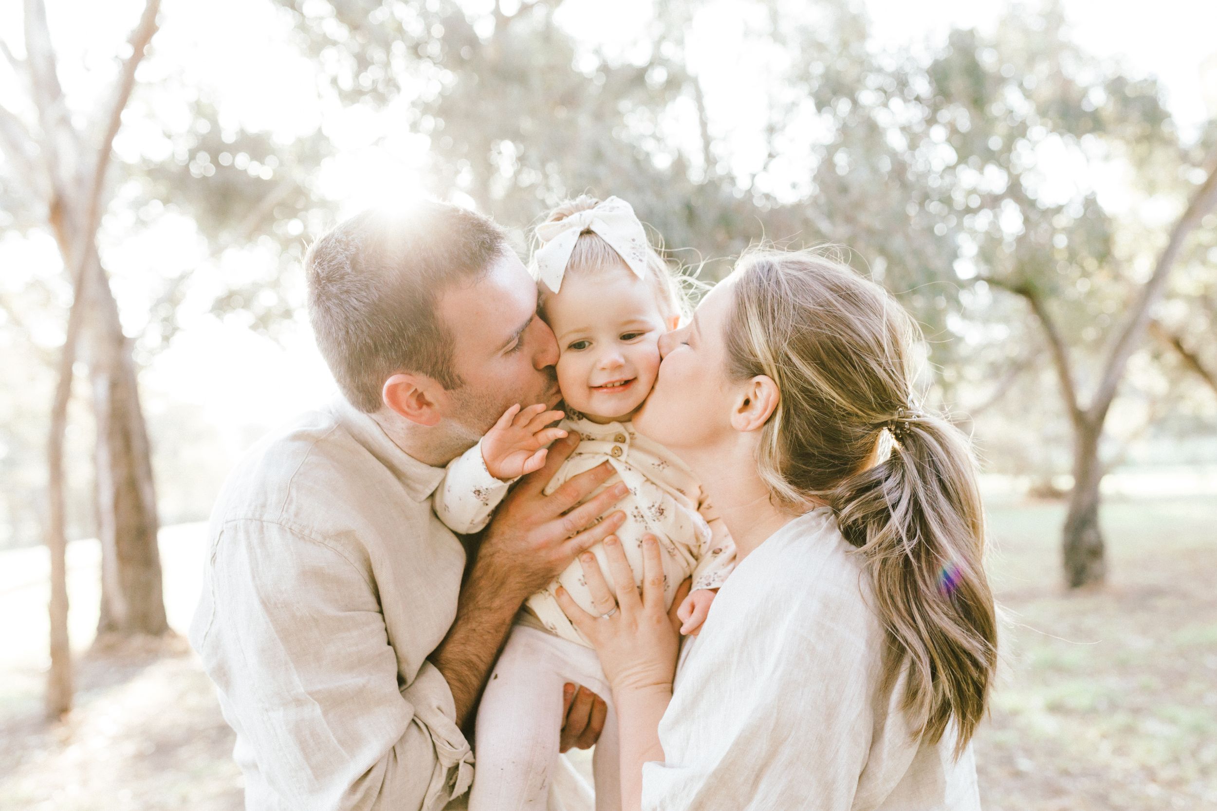 A collection of romantic outdoor photography moments showing couples embracing in a natural setting with soft lighting.