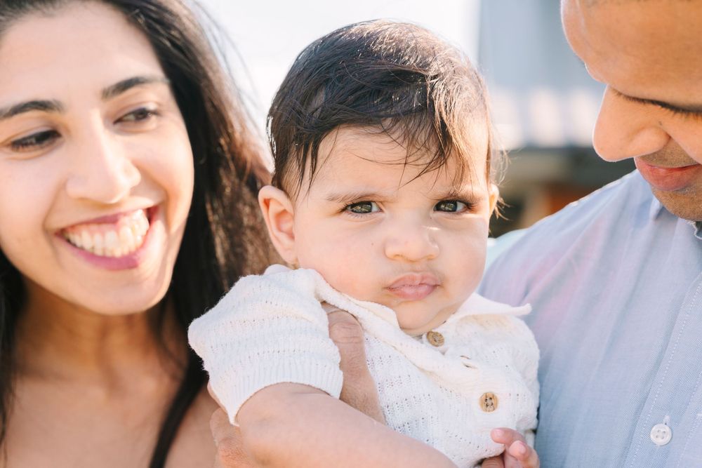 Close-up portrait series showing joyful expressions and warm embraces.