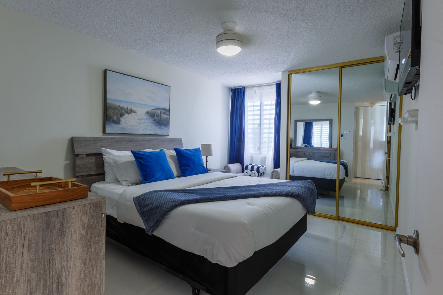 Real estate photography. Bedroom. Short-term rental in Playa Azul Tower 1 in Luquillo, Puerto Rico.