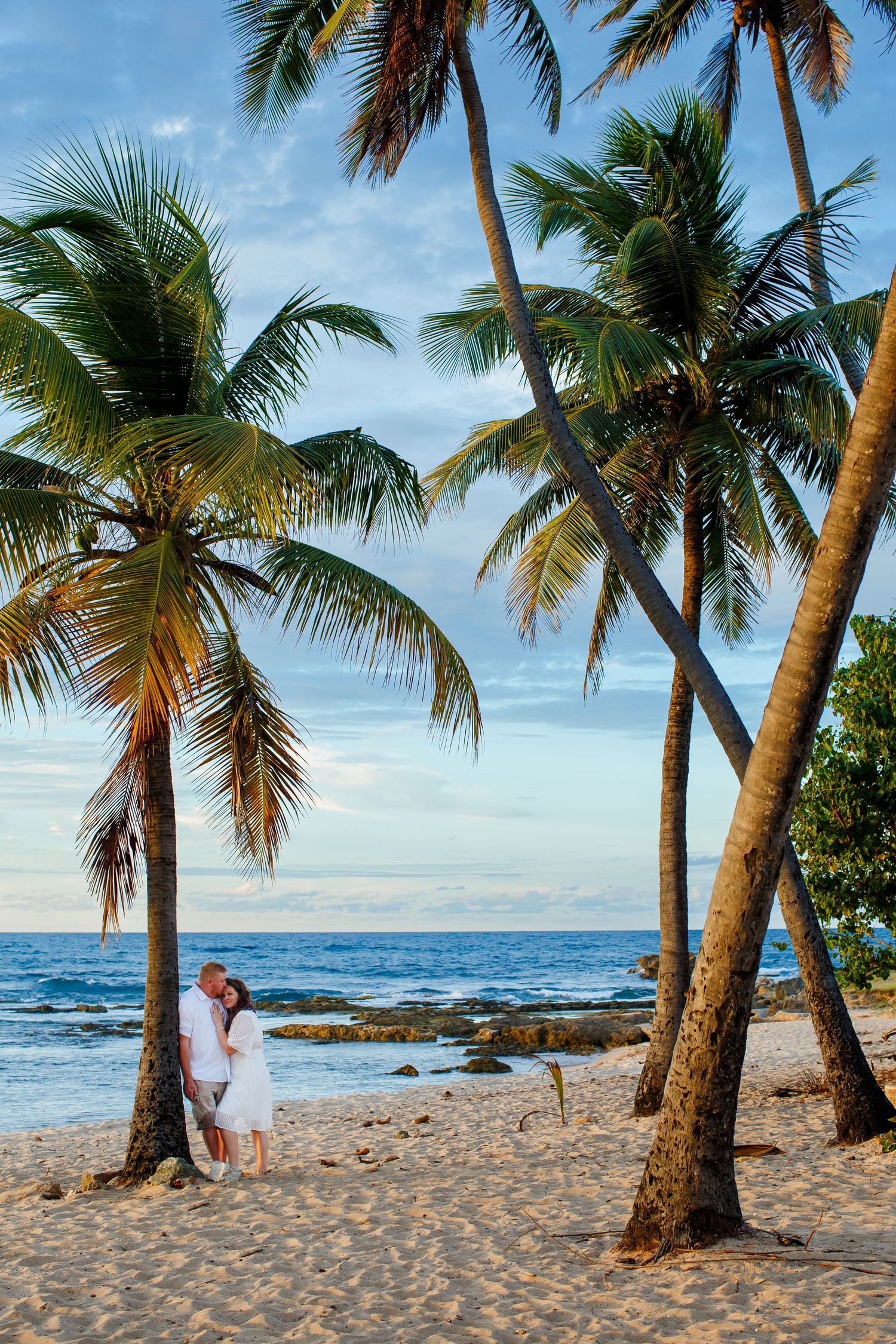Elopement on the beach at Balneario del Escambrón in Old San Juan, Puerto Rico. Couples portrait - bride and groom.