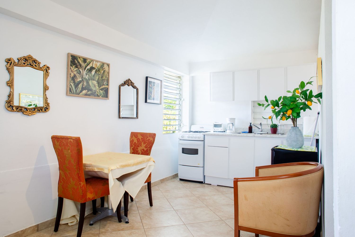 Real estate photo. Short-term rental in Aguas Buenas, Puerto Rico. Kitchen, dining area.
