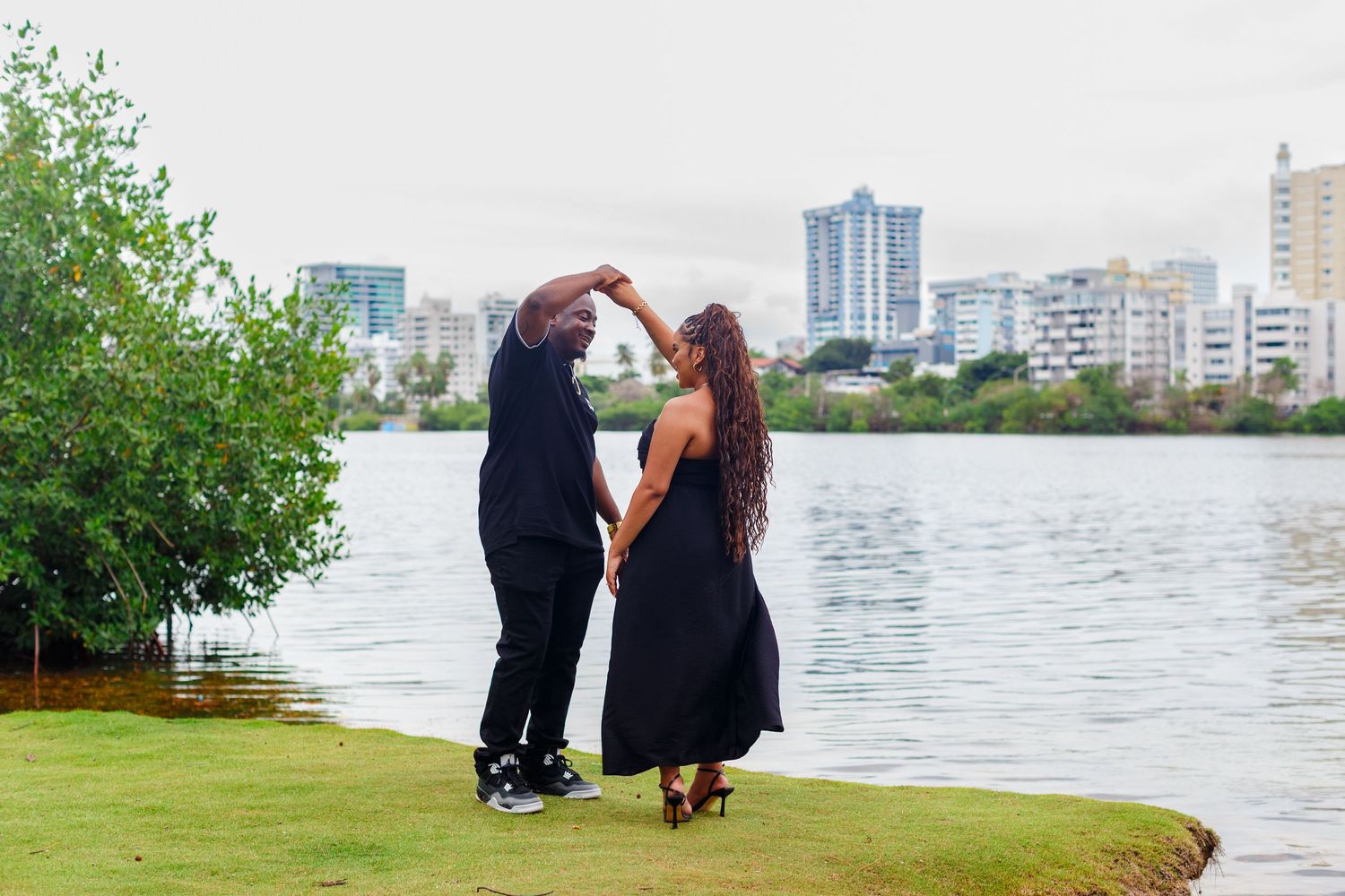 Couples portrait near Condado Lagoon in San Juan, Puerto Rico.