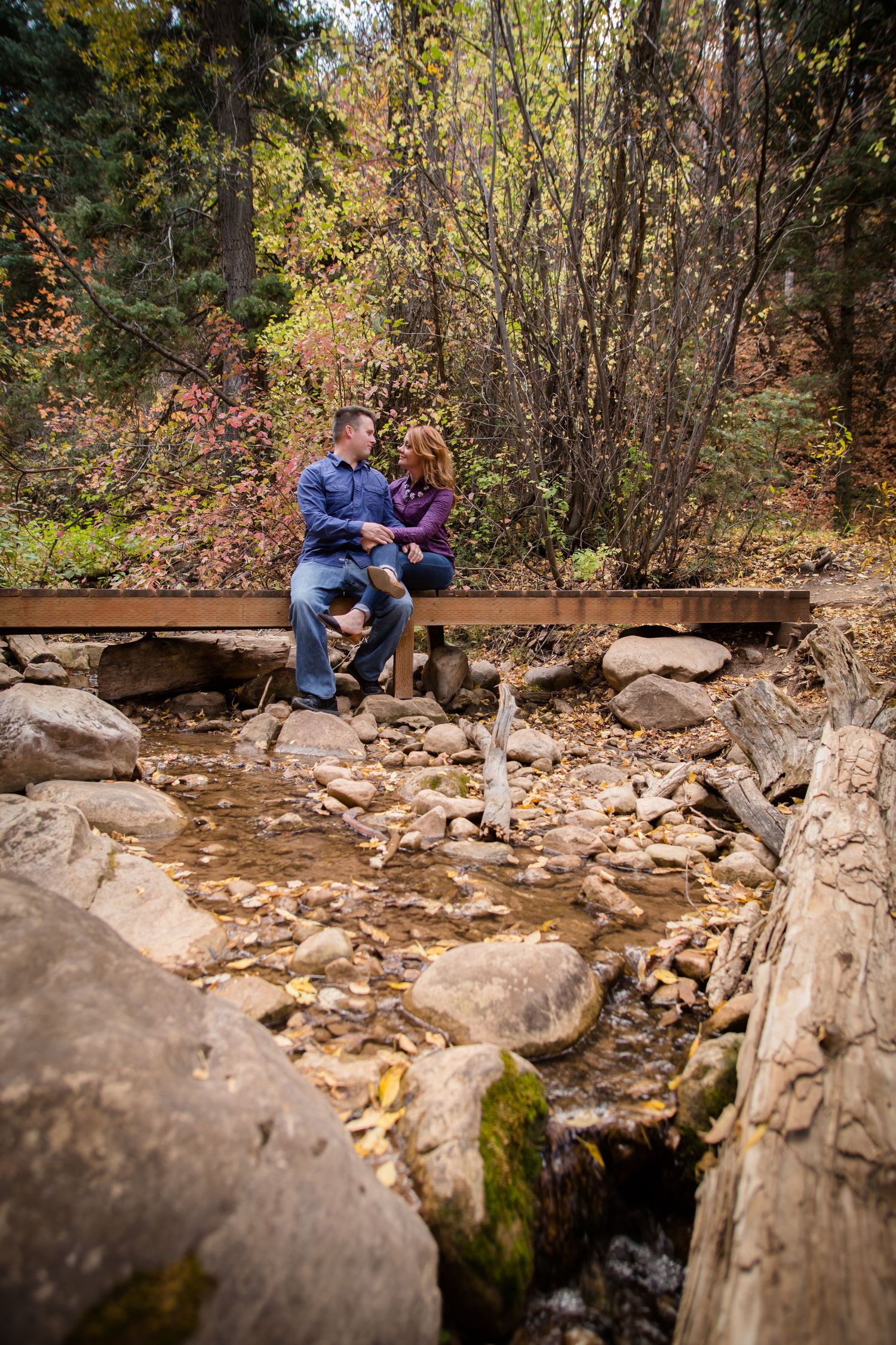 couple on bridge in payson utah canyon grotto falls trail