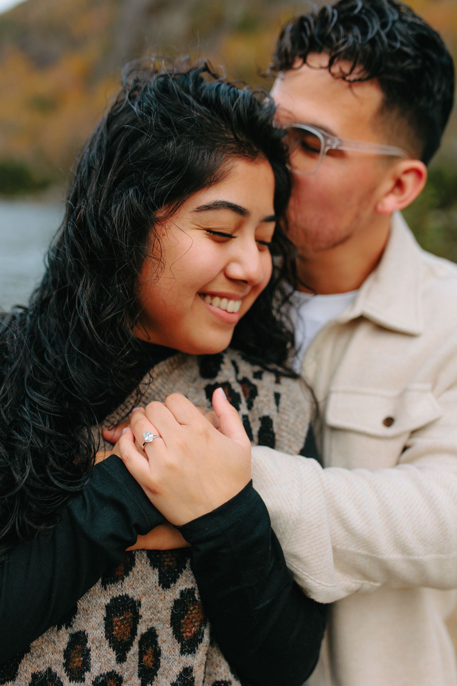 A romantic sequence of candid moments showing a couple sharing tender embraces and laughter outdoors.