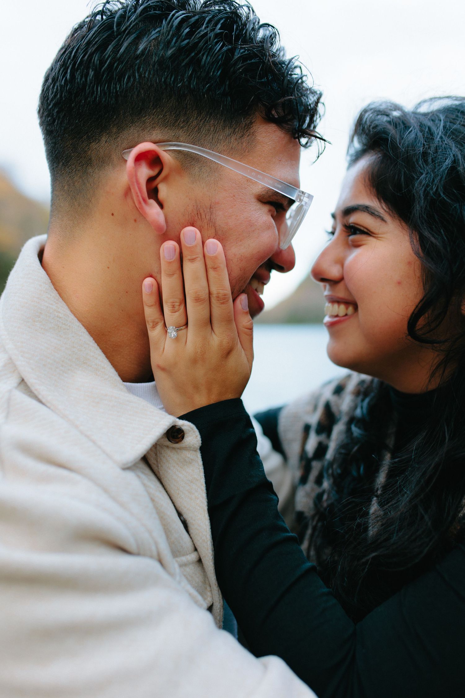 A series of intimate close-up shots showing a couple sharing sweet moments and smiles together.