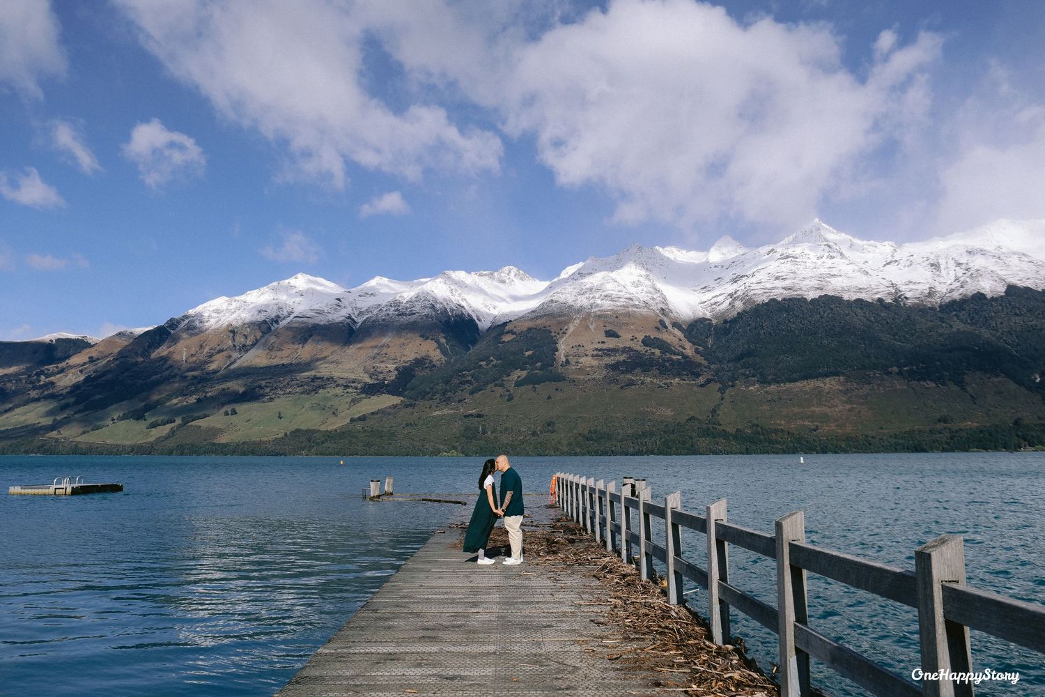 Queenstown wedding photographer capturing candid moments by the Glenorchy Wharf.