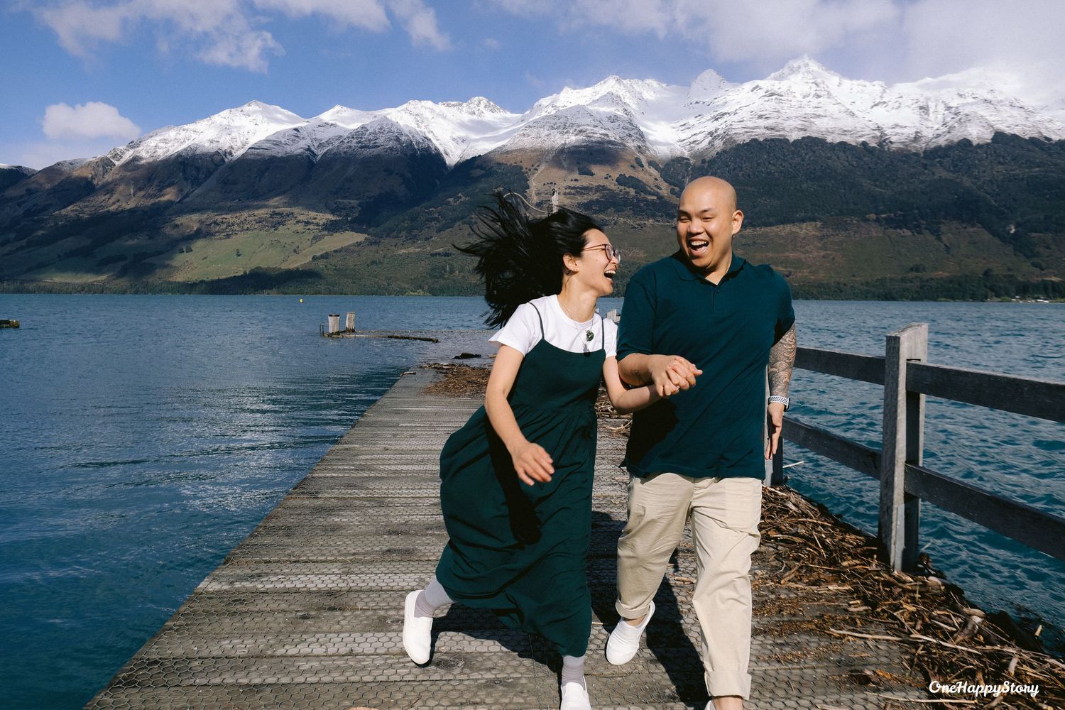 Light and candid engagement portraits taken by One Happy Story Studios in Glenorchy.