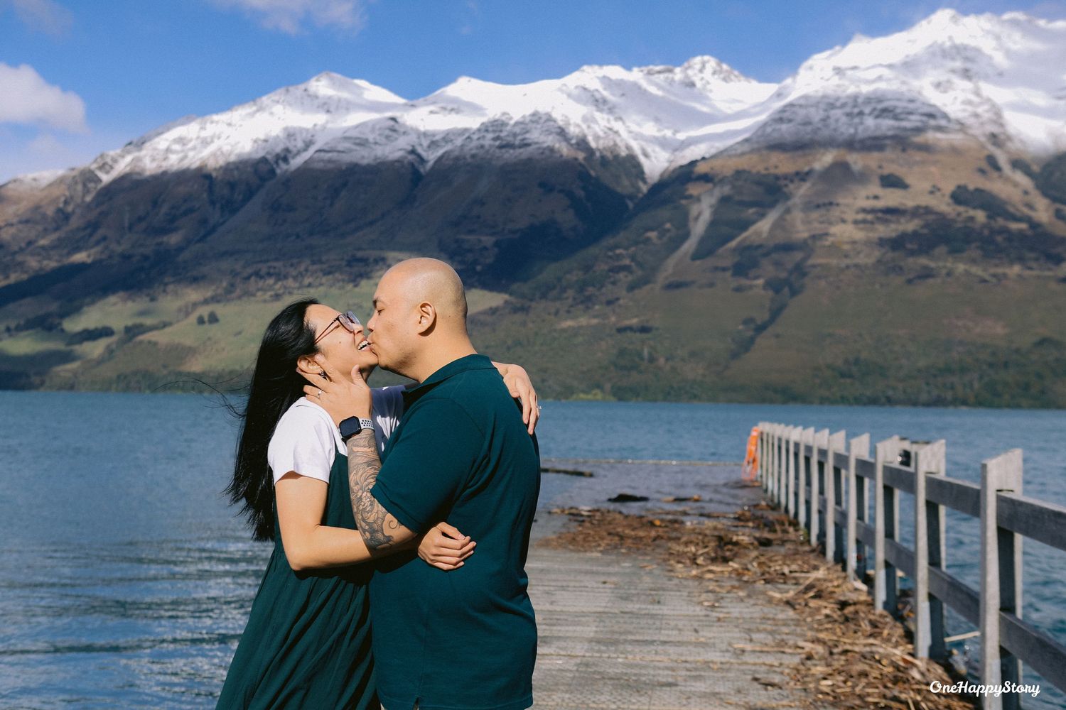 Couple laughing together during their New Zealand pre-wedding photo session.