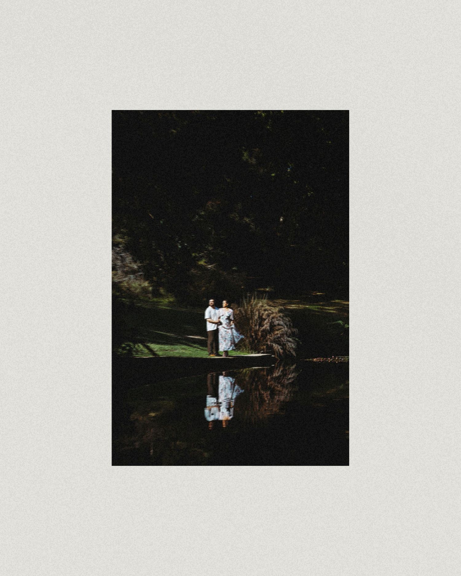 Engagement couple by the lake at Palácio de Monserrate gardens