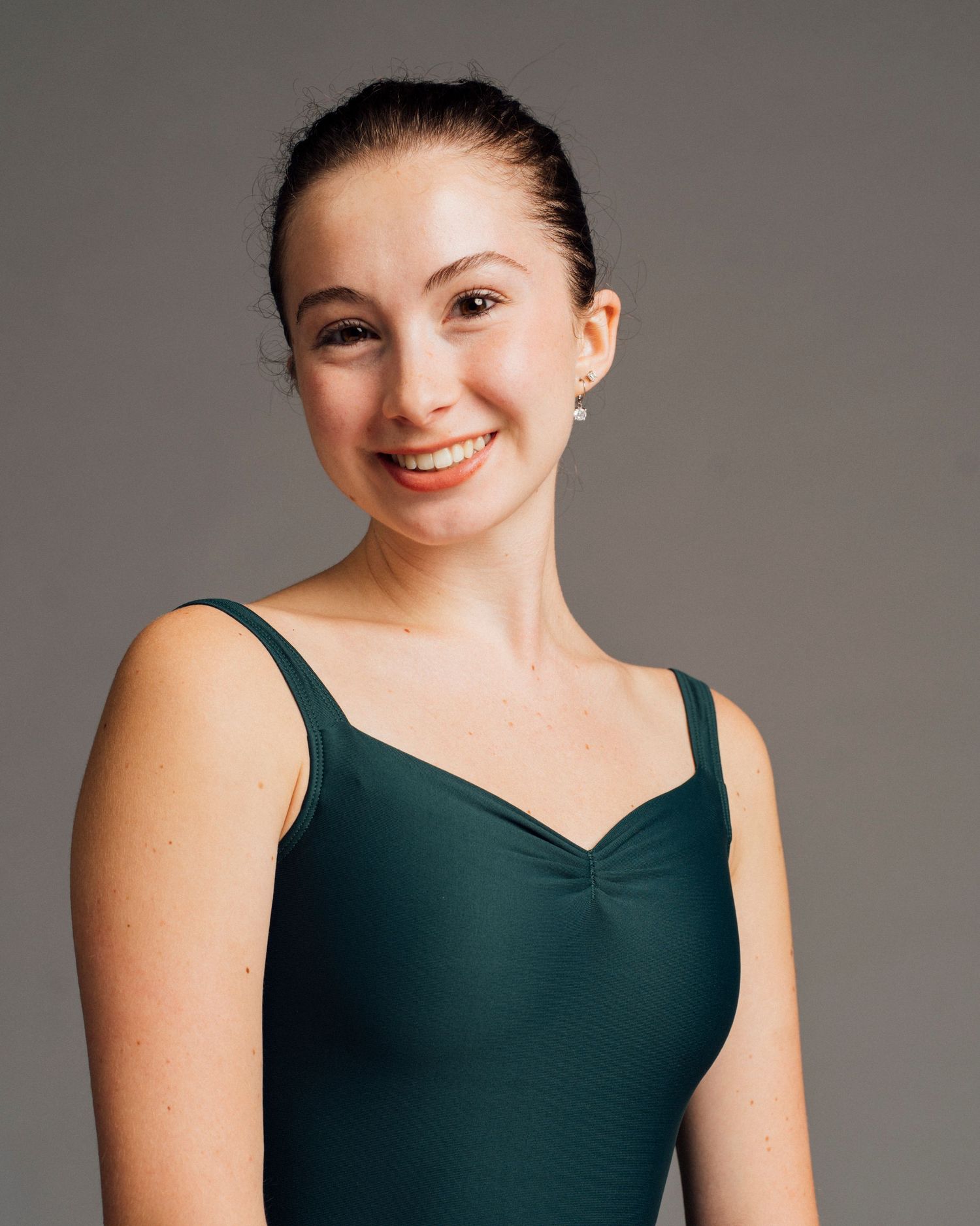 Professional dance headshots Chicago style with professional lighting for advanced ballet student audition.