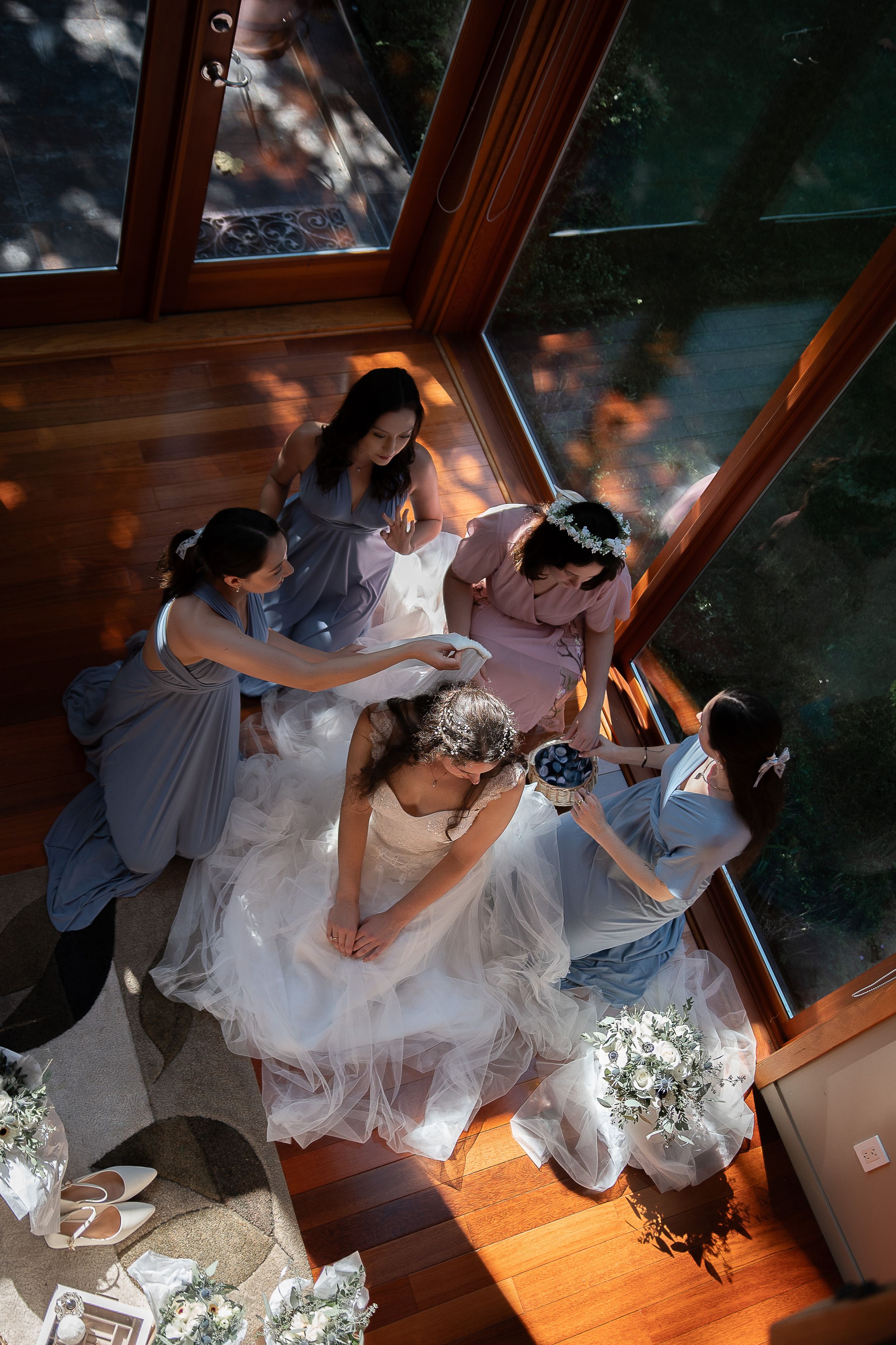 A sequence of dance moves captured in a wooden room showing a dip move in dramatic lighting.