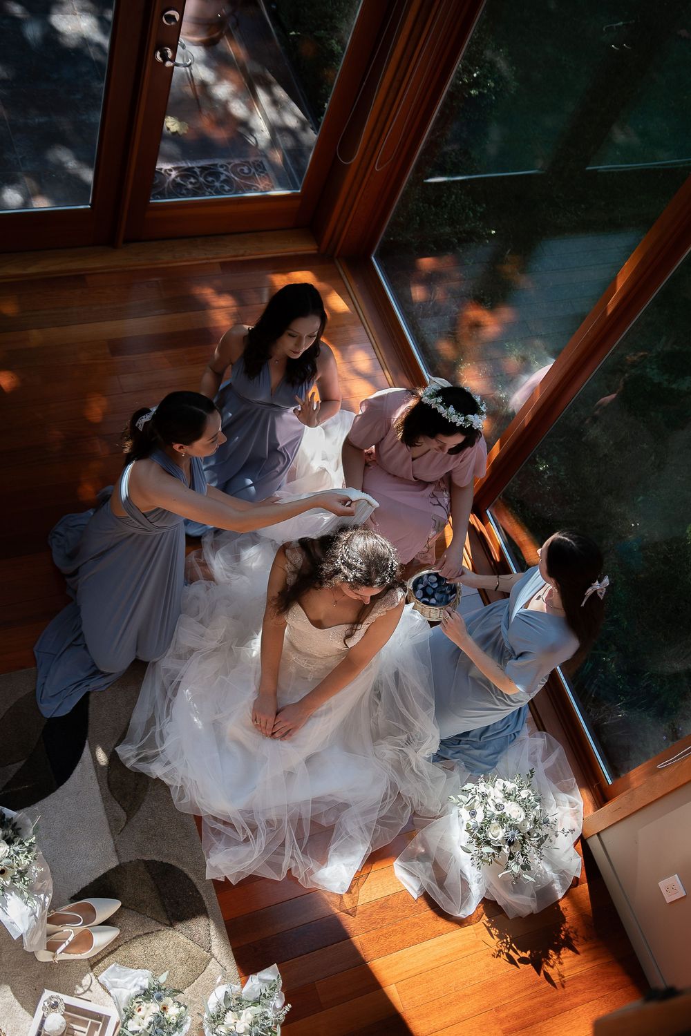 A sequence of dance moves captured in a wooden room showing a dip move in dramatic lighting.