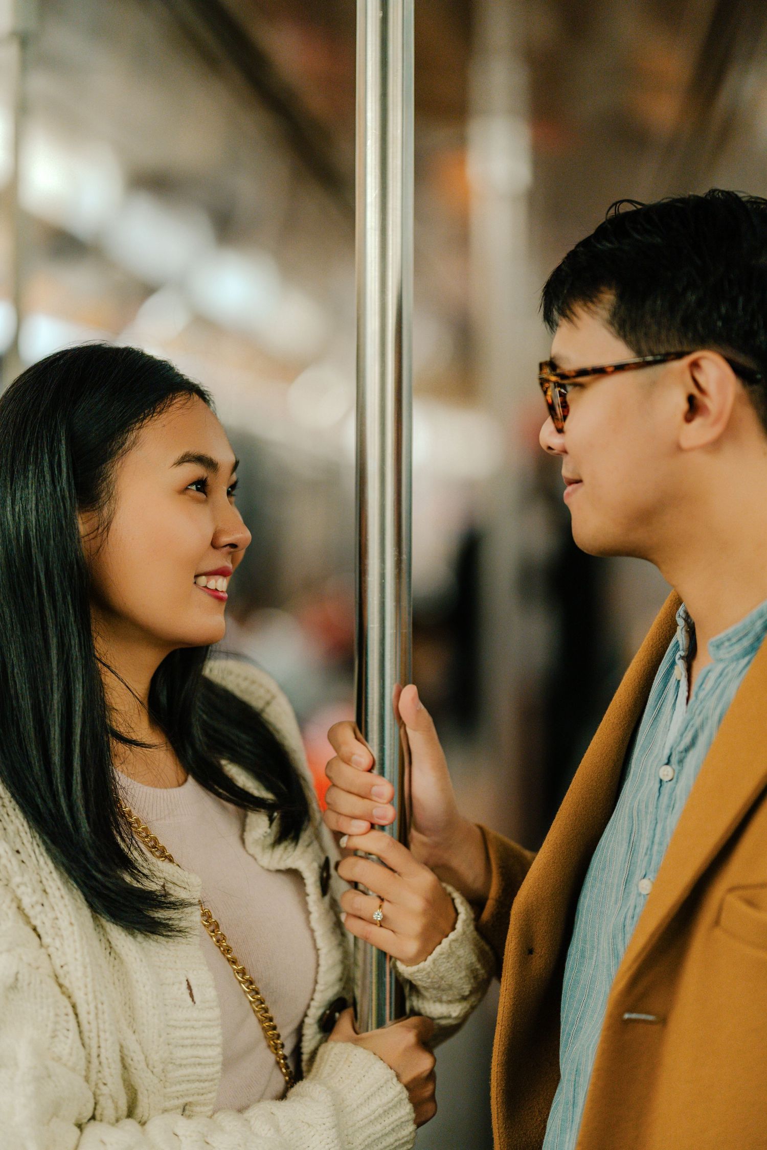 A couple shares a tender moment laughing together in a sequence of candid photos.