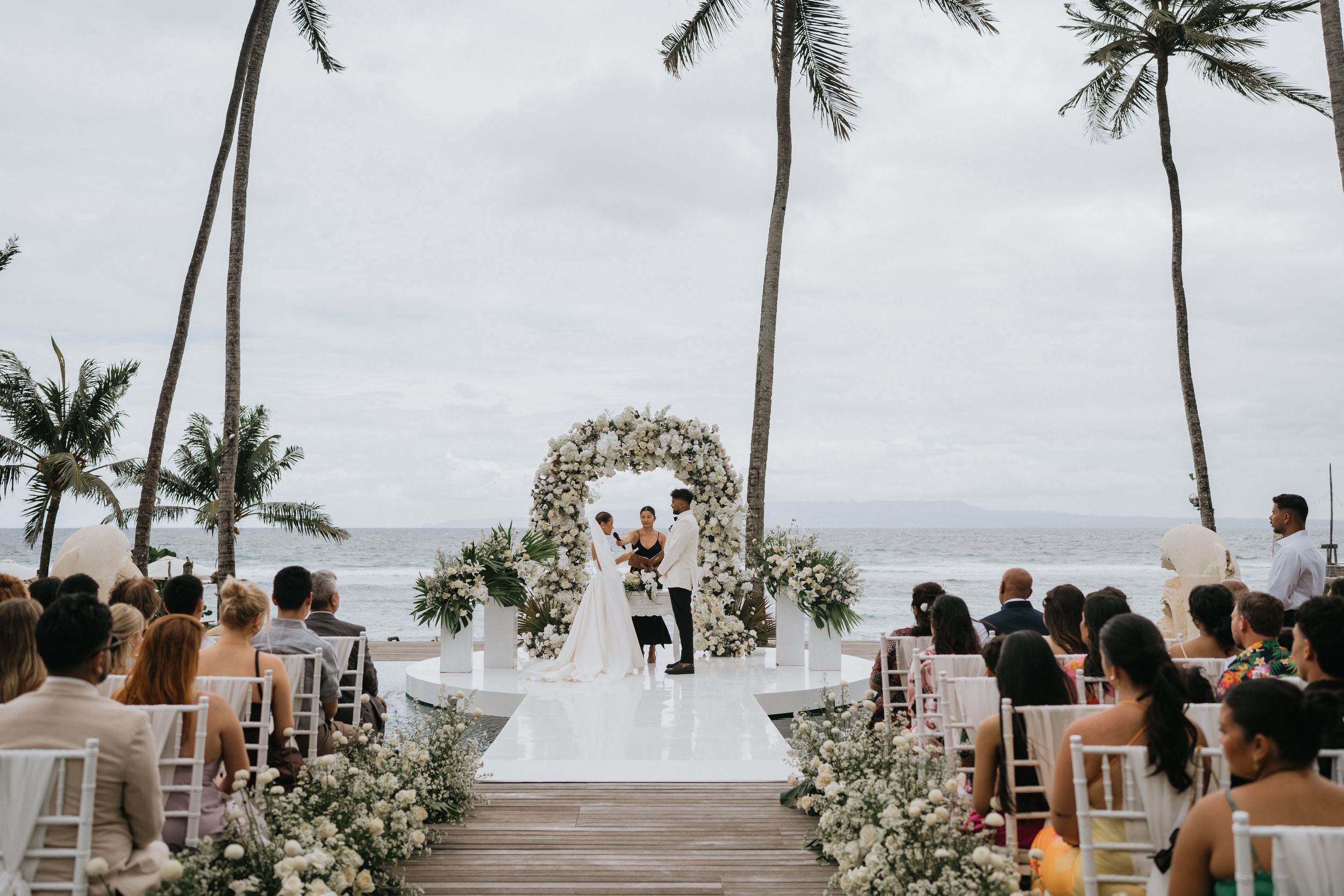 Bali resort wedding photography with ocean view ceremony