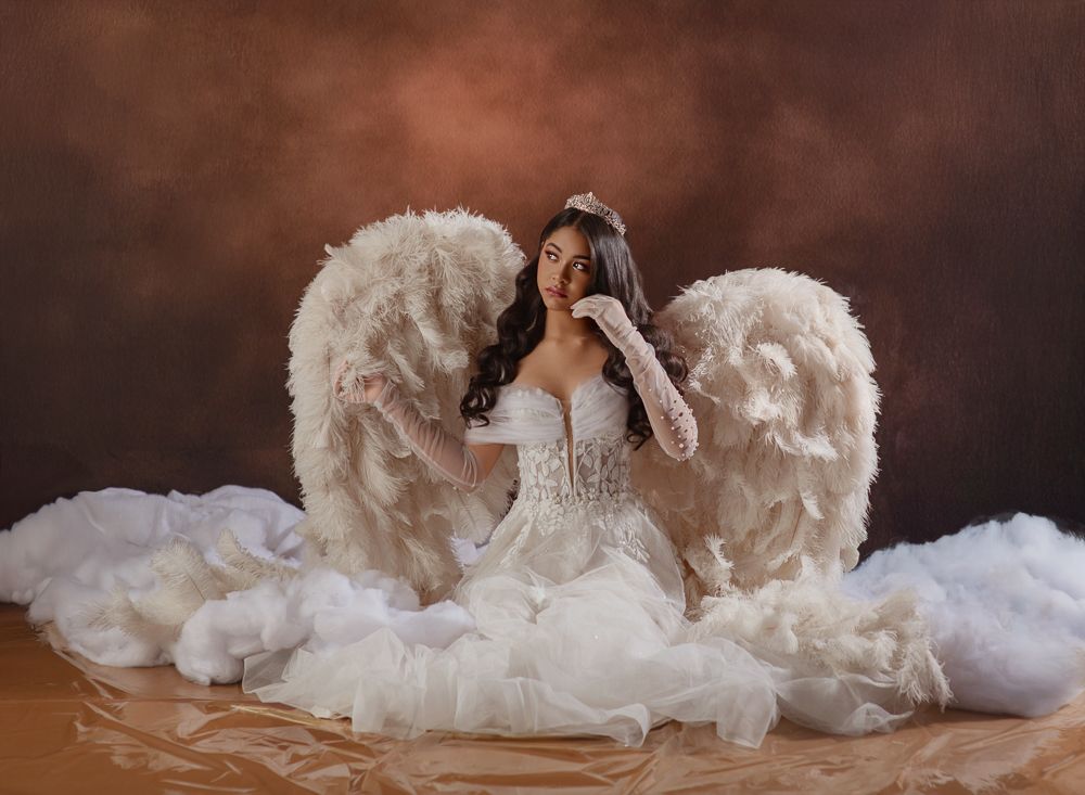 A graceful ballerina in white tulle dress performs an elegant dance sequence across multiple poses.