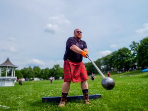 A competitor prepares to throw a heavy weight during Highland Games competition.