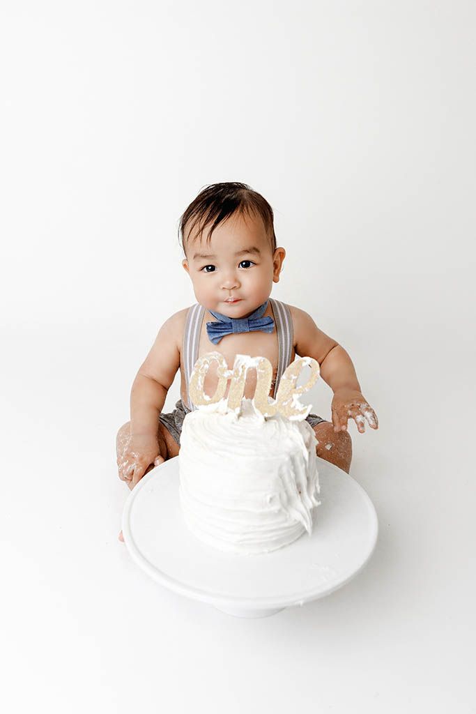 Professional photographer near French Valley CA in Murrieta - Baby boy with his first birthday cake smash.