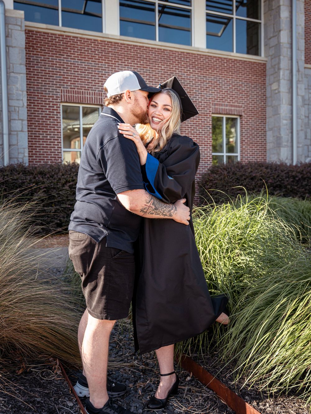 Cartersville Georgia Highlands College Campus. RN Graduate Portrait Session. Alumni. Nursing School Graduate with Supportive Spouse
