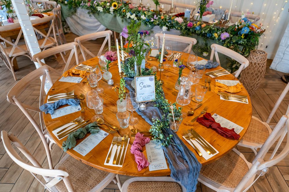 Reception table all set up ready for Wedding breakfast at Watermouth Cove Weddings