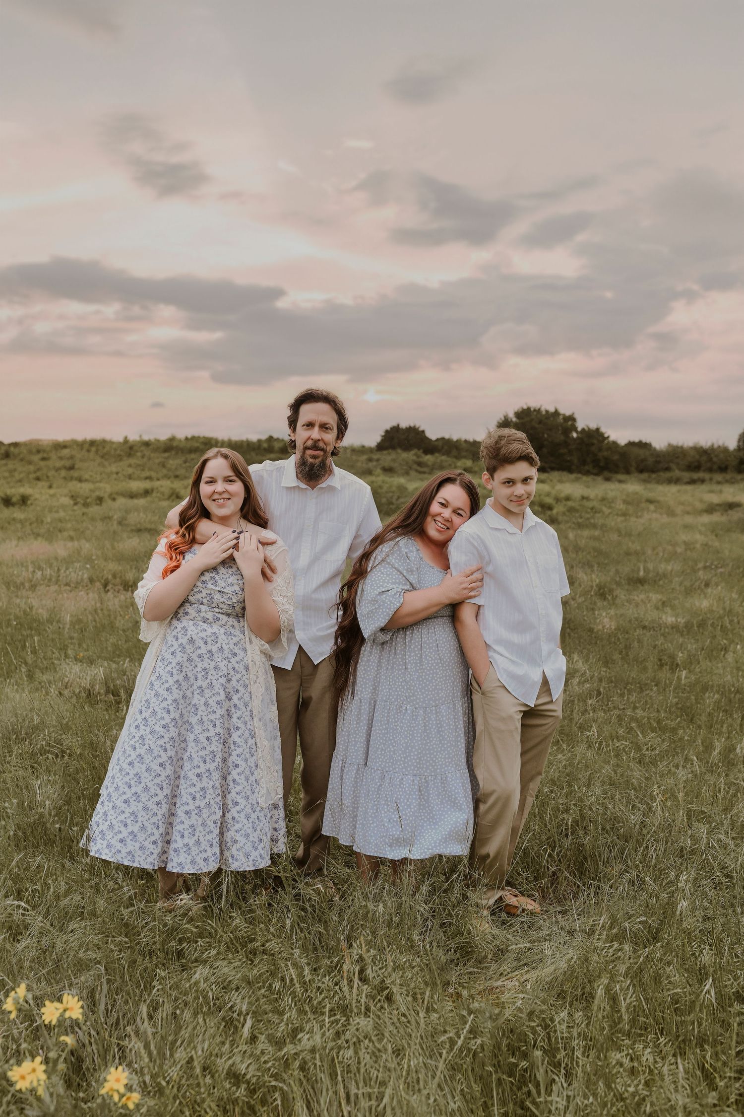 Three-generation family portrait session with warm sunset light in Plano, Texas