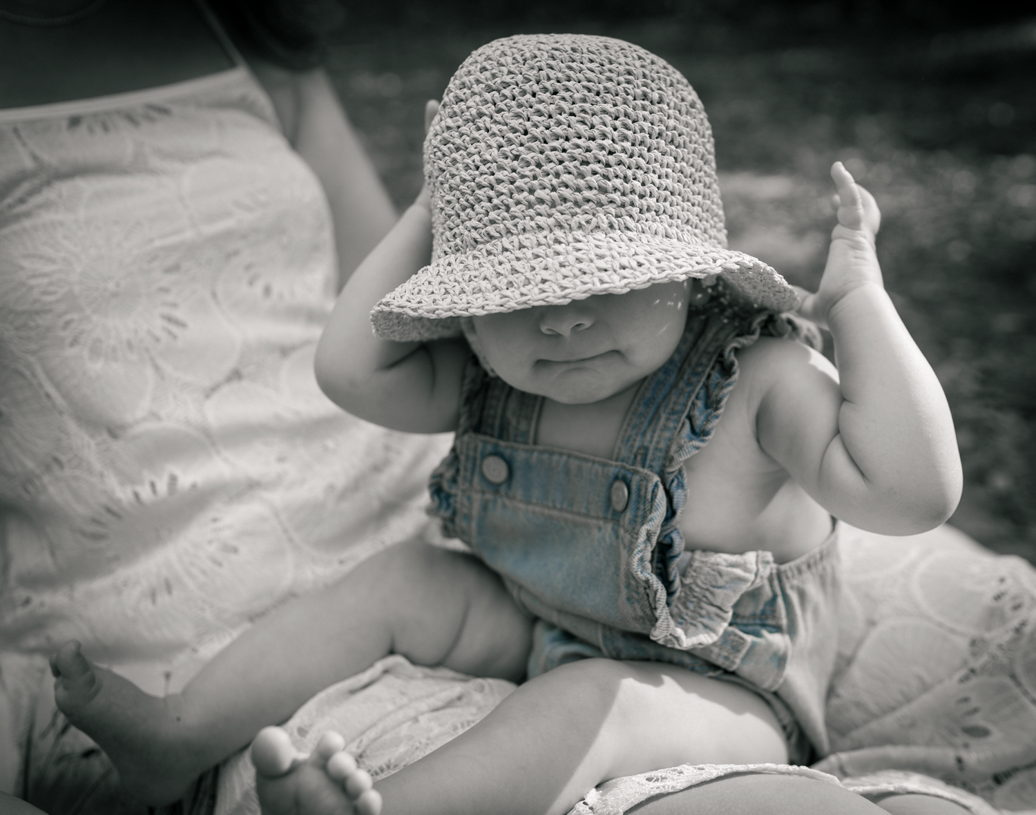 Half bloomed maternity portrait on the beach