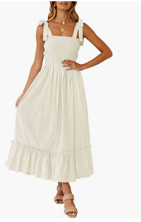 Women's cream smocked bodice midi dress with tie straps, ruffle hem, and A-line silhouette.