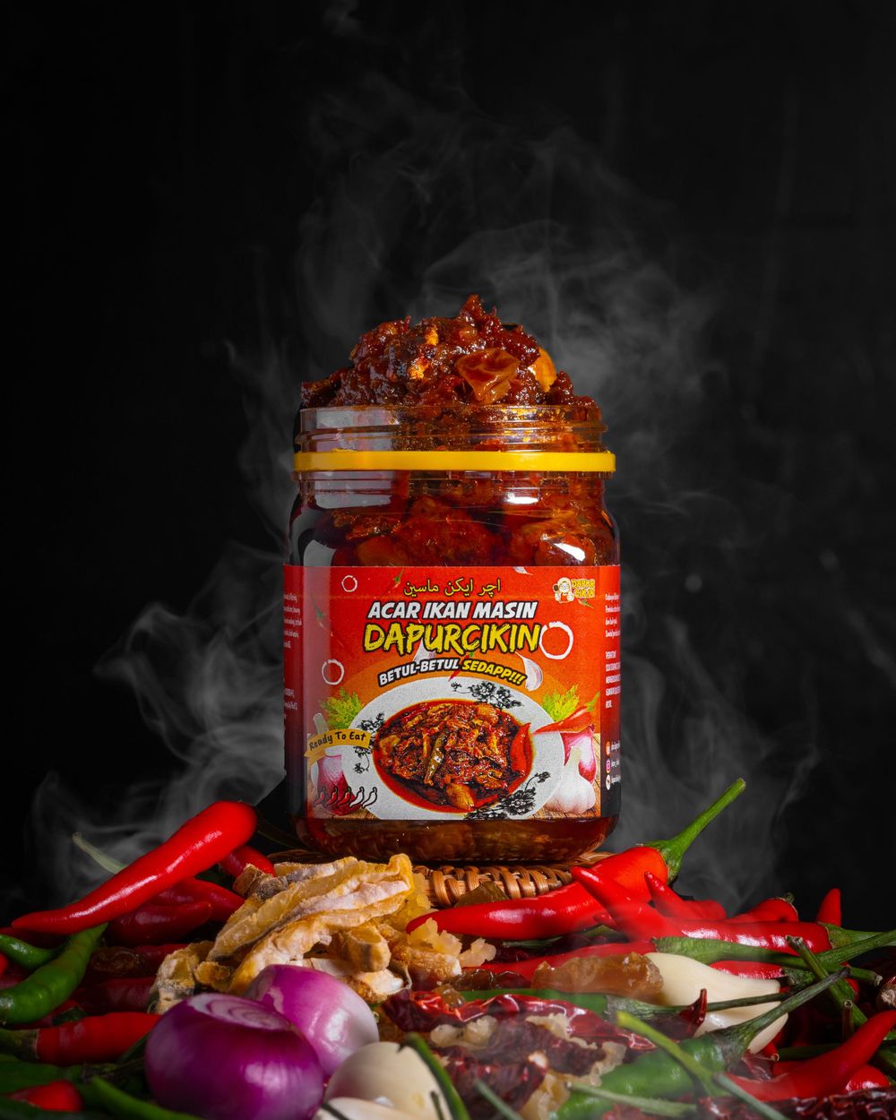 Spicy Asian sauce jars surrounded by fresh chili peppers and aromatic ingredients in dark lighting.
