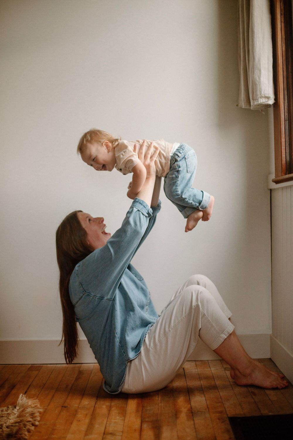 Mother and son during their lifestyle at home family session.