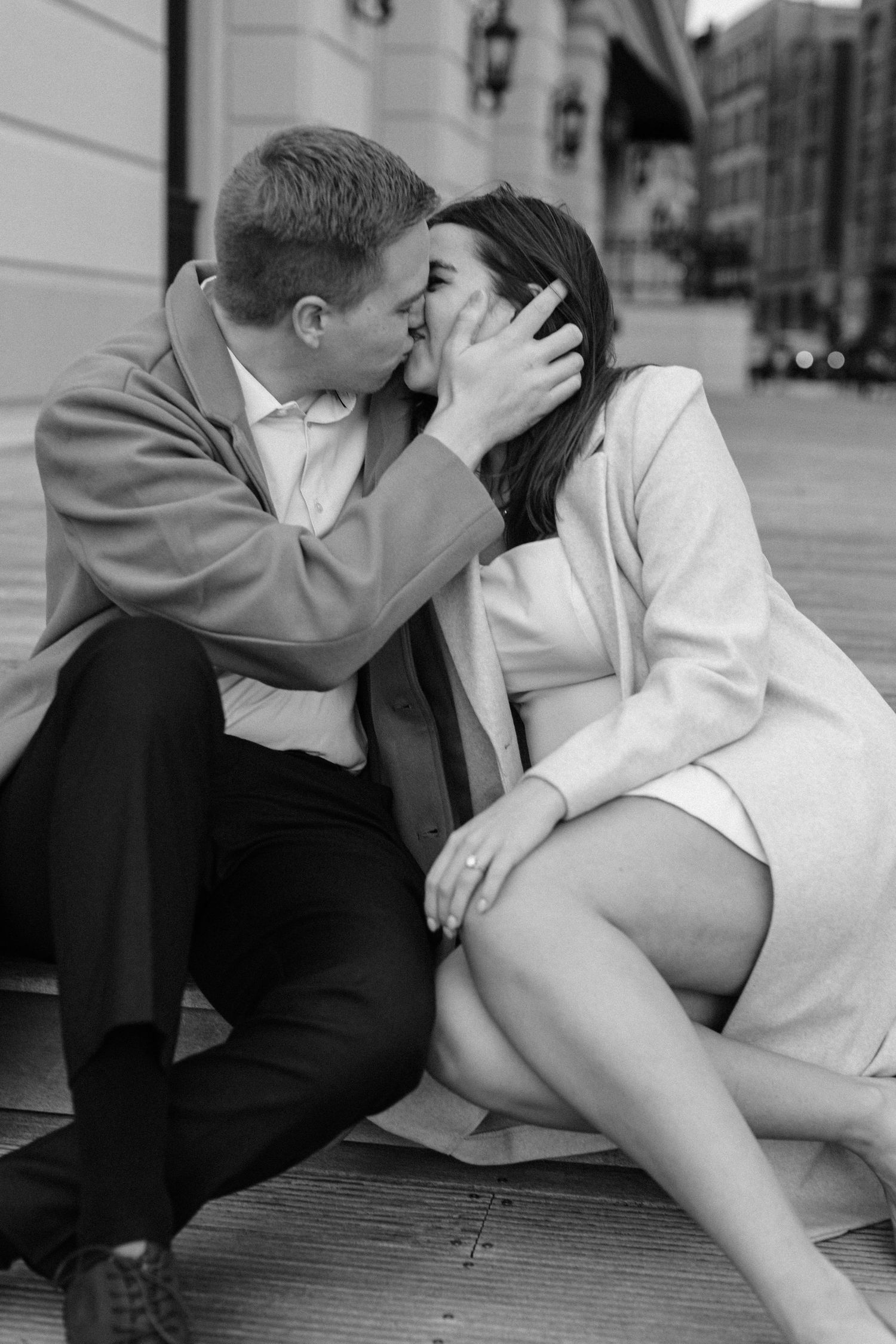 Candid black and white engagement photo of couple in Milwaukee
