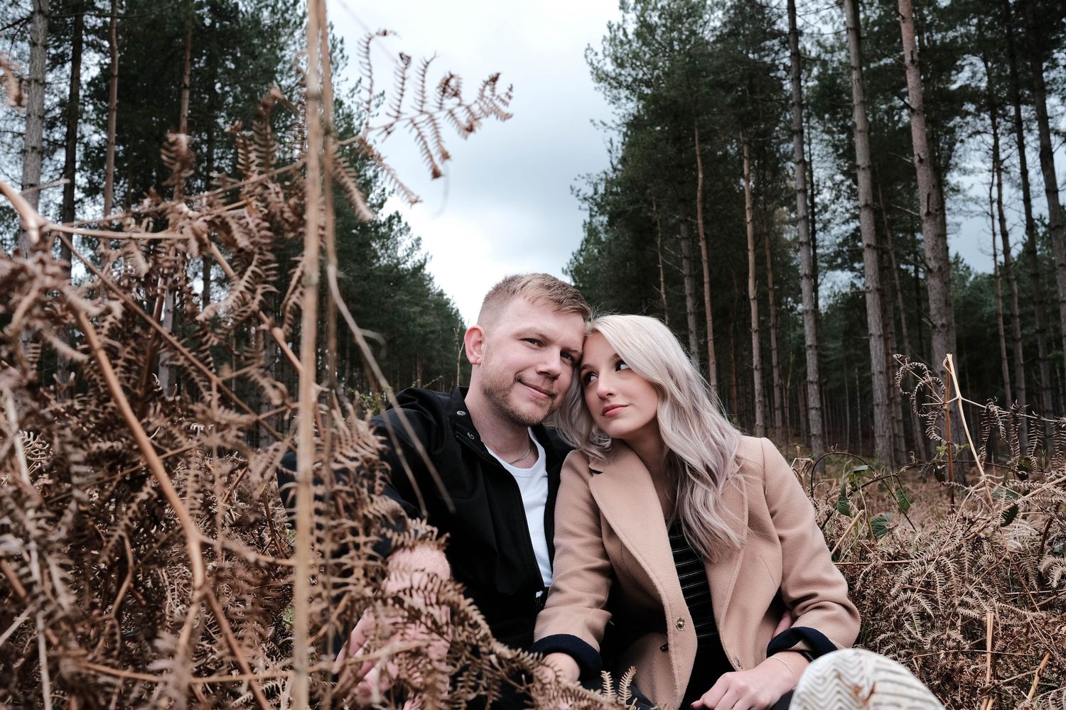Abbey gazing at Luke whilst sitting amongst the spring time plants in Cannock Chase Country Park, Staffordshire.