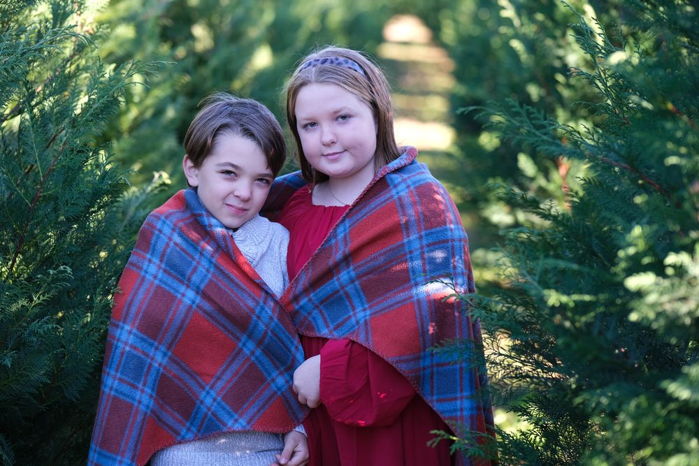Family photoshoot. Siblings. Christmas tree farm.