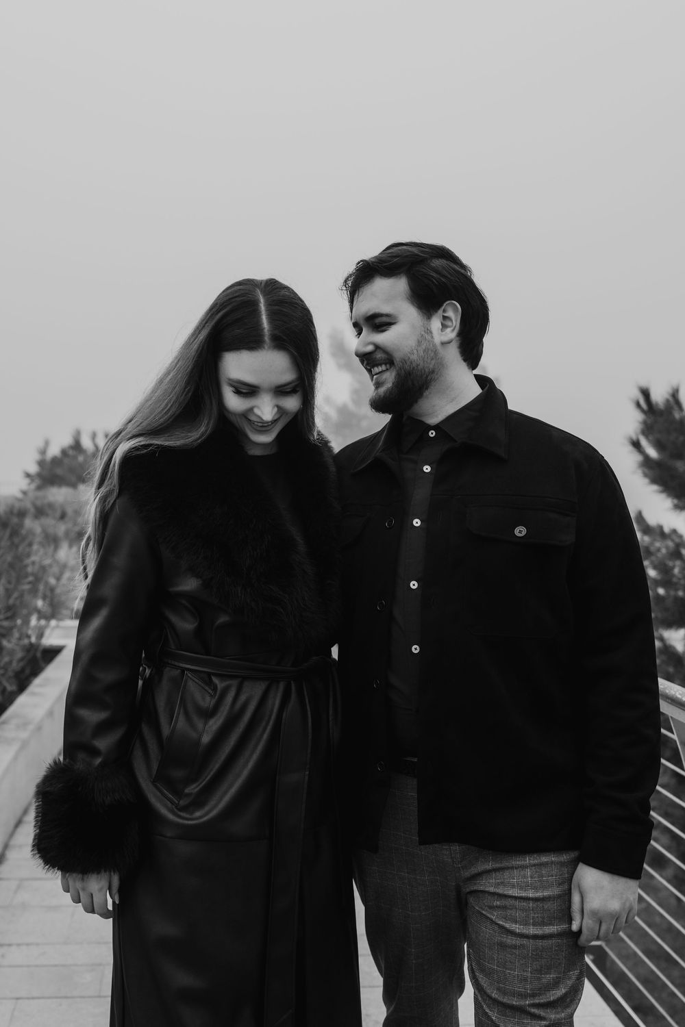 Intimate and emotional look between an engaged couple during a moody session in Portopiccolo.