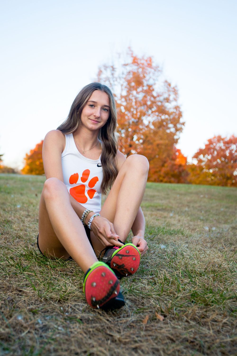track spikes close up senior athlete detail photo Michigan senior photography session