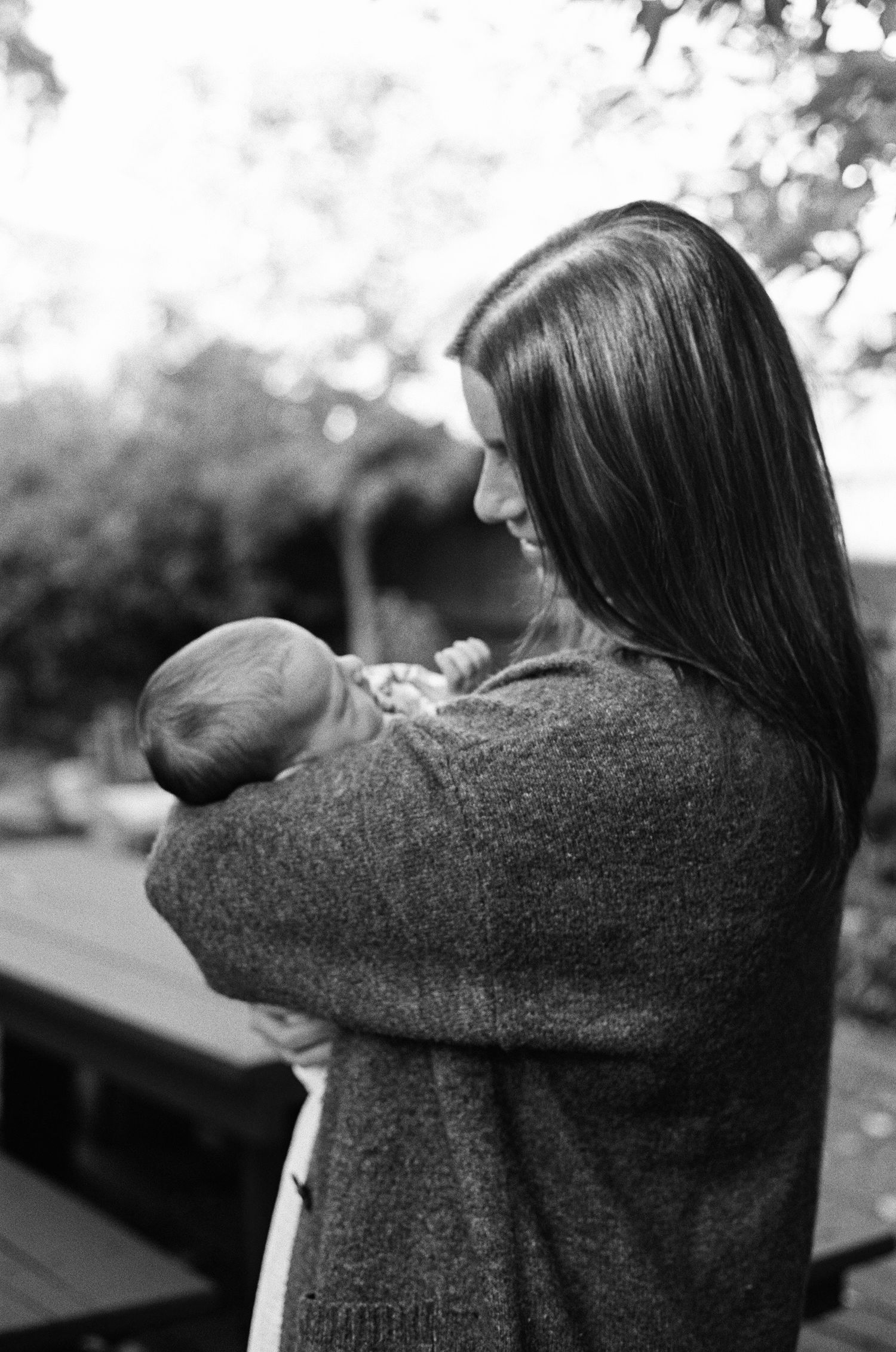 natural light family photography with children and parents, intimate and unposed storytelling on 35mm film