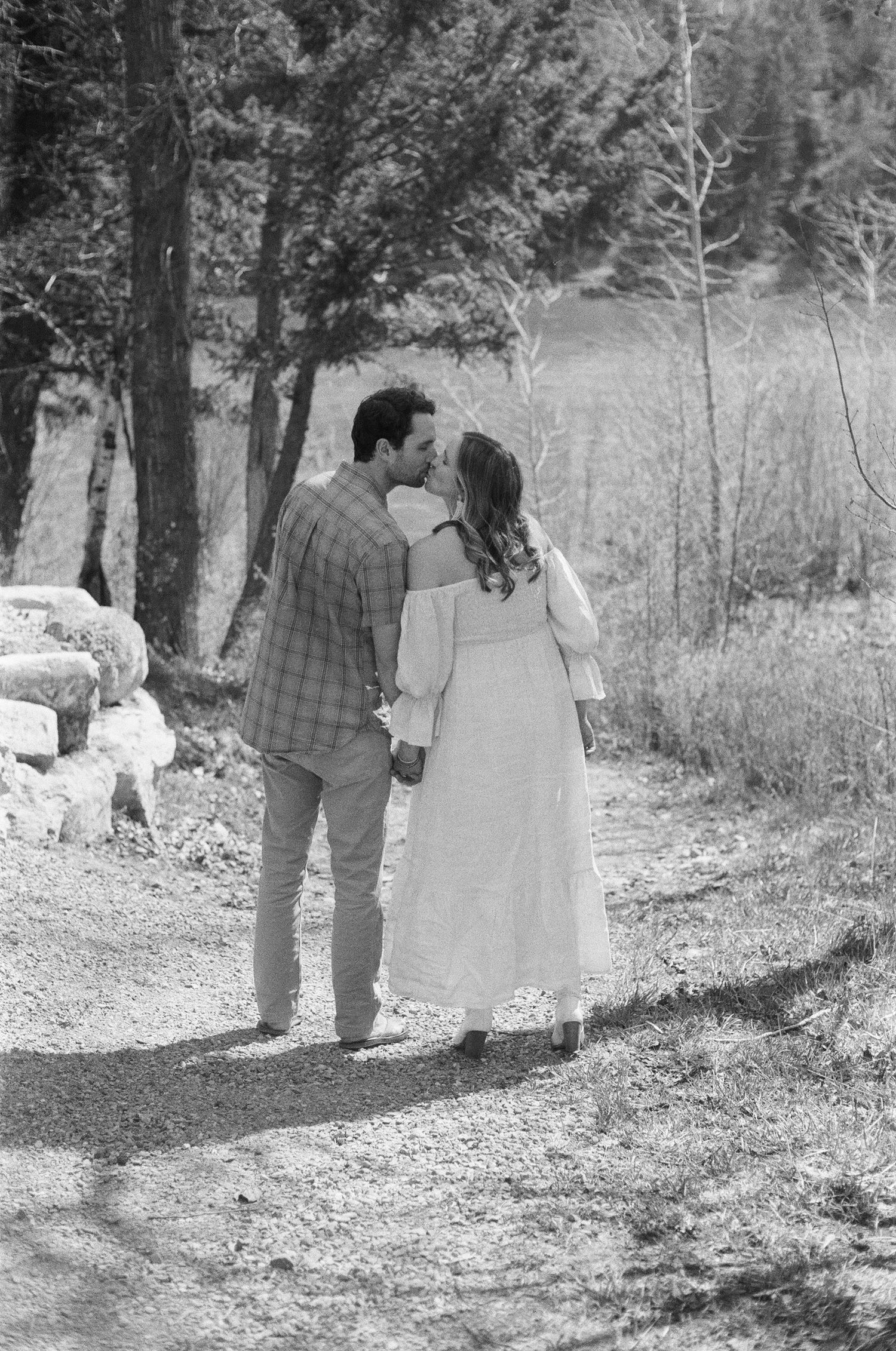 outdoor lifestyle photography session on 35mm film in Whitefish Montana with golden hour light and movement