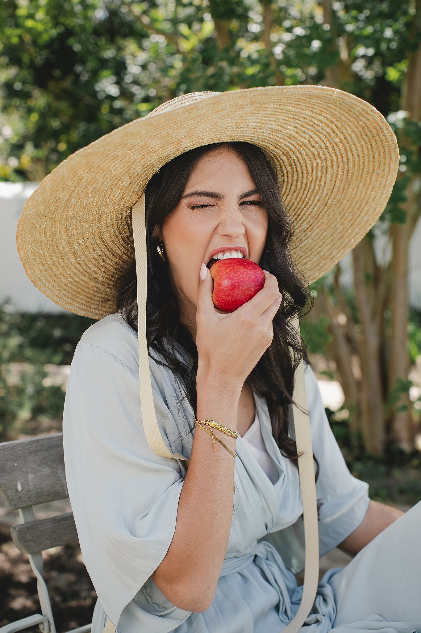 Pink Lady apples styled in a bright, clean setting with a fresh aesthetic.