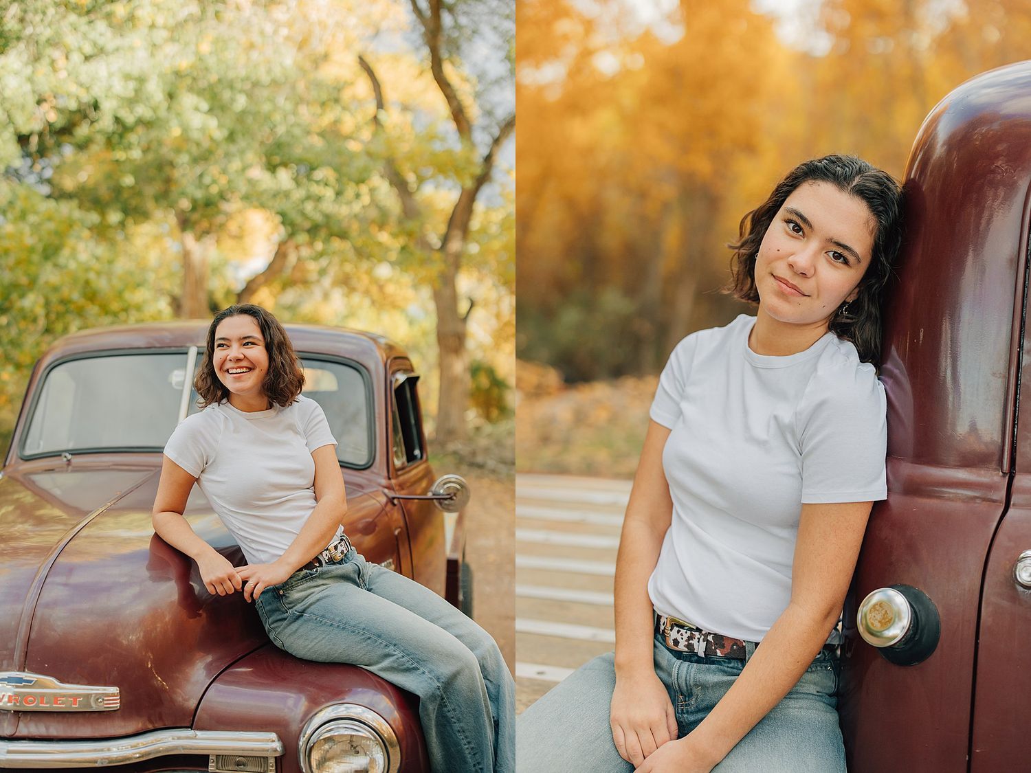 Young woman in white tee and jeans posing against a vintage red truck surrounded by golden autumn foliage.