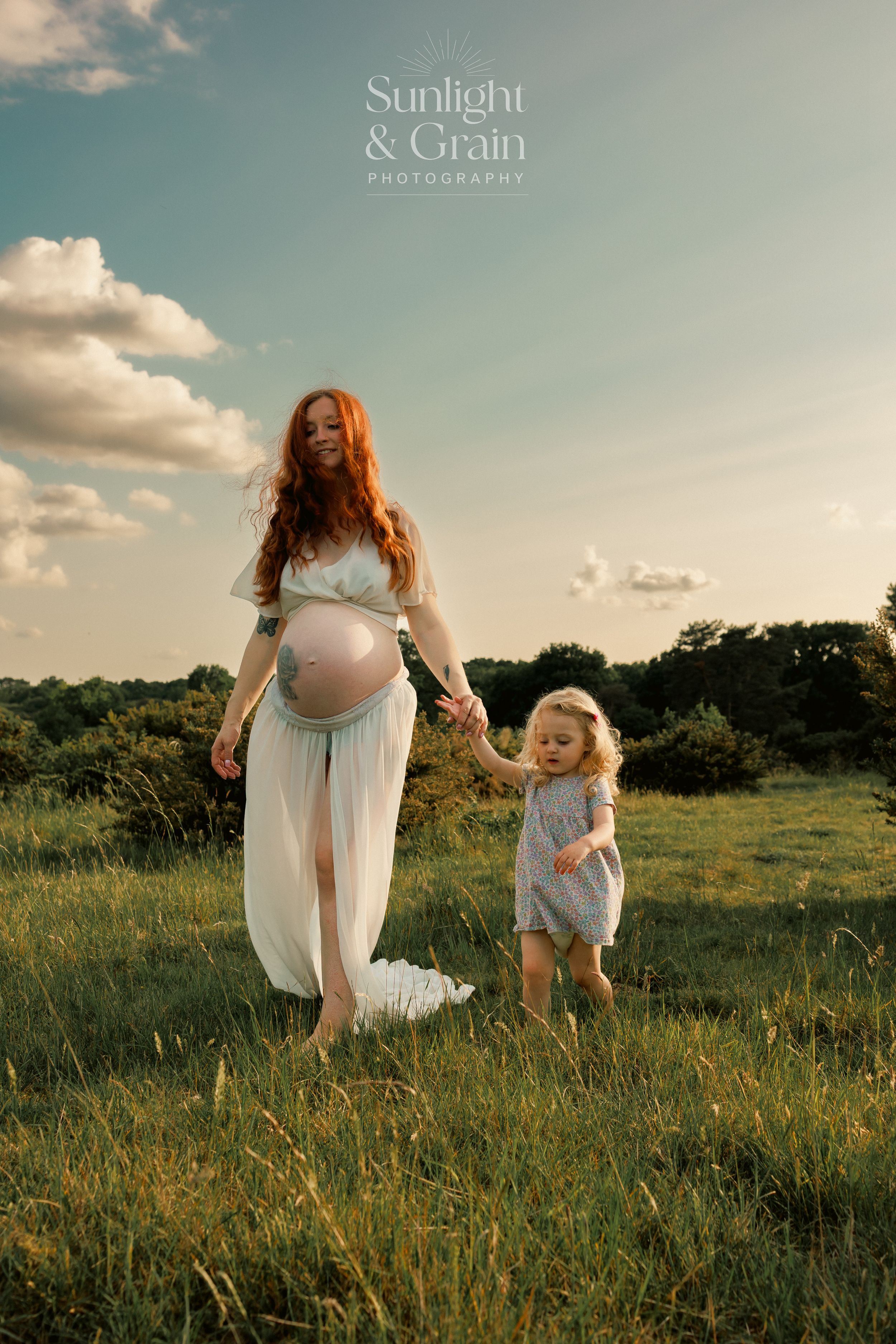 Outdoor maternity soulful, natural light, colourful, mama and daughter walking holding hands, Thetford, female empowerment session