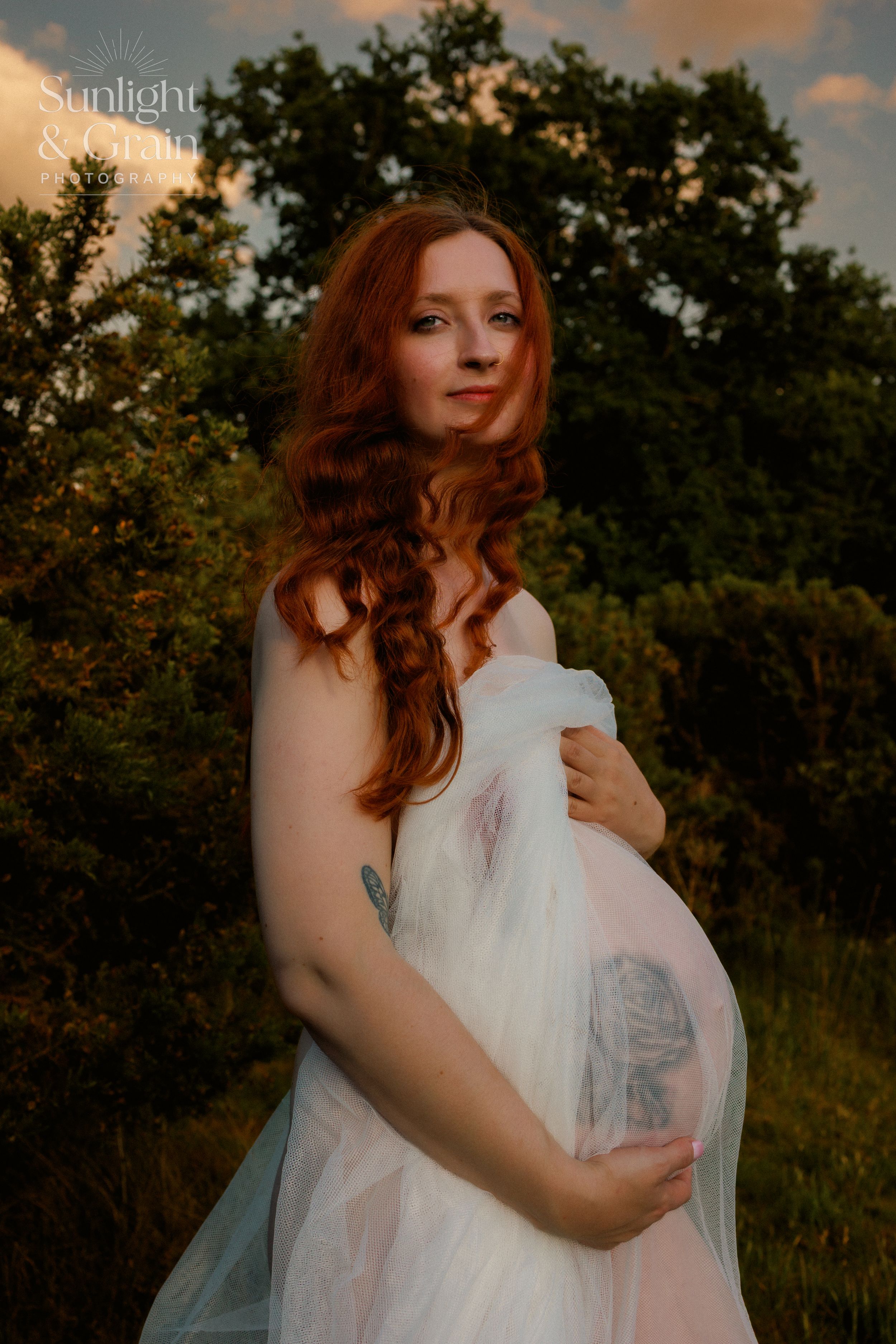 Outdoor maternity soulful, natural light, colourful, lady holding bump, sensual, while veil, Thetford, female empowerment session