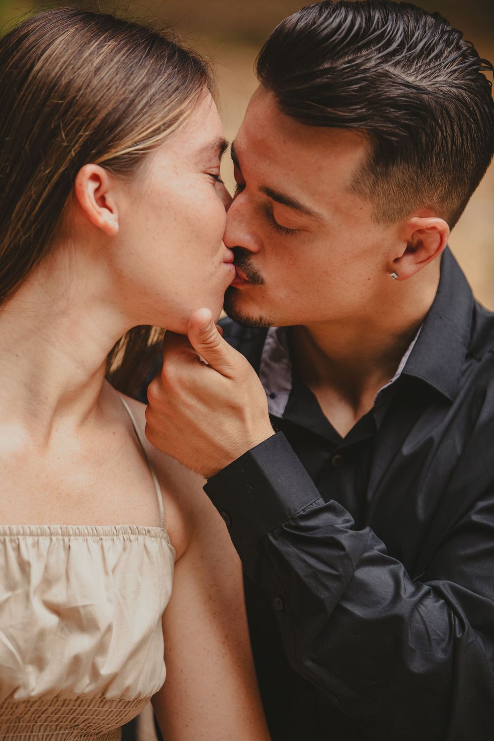 Romantic close-up profile shots of couple sharing intimate moments.